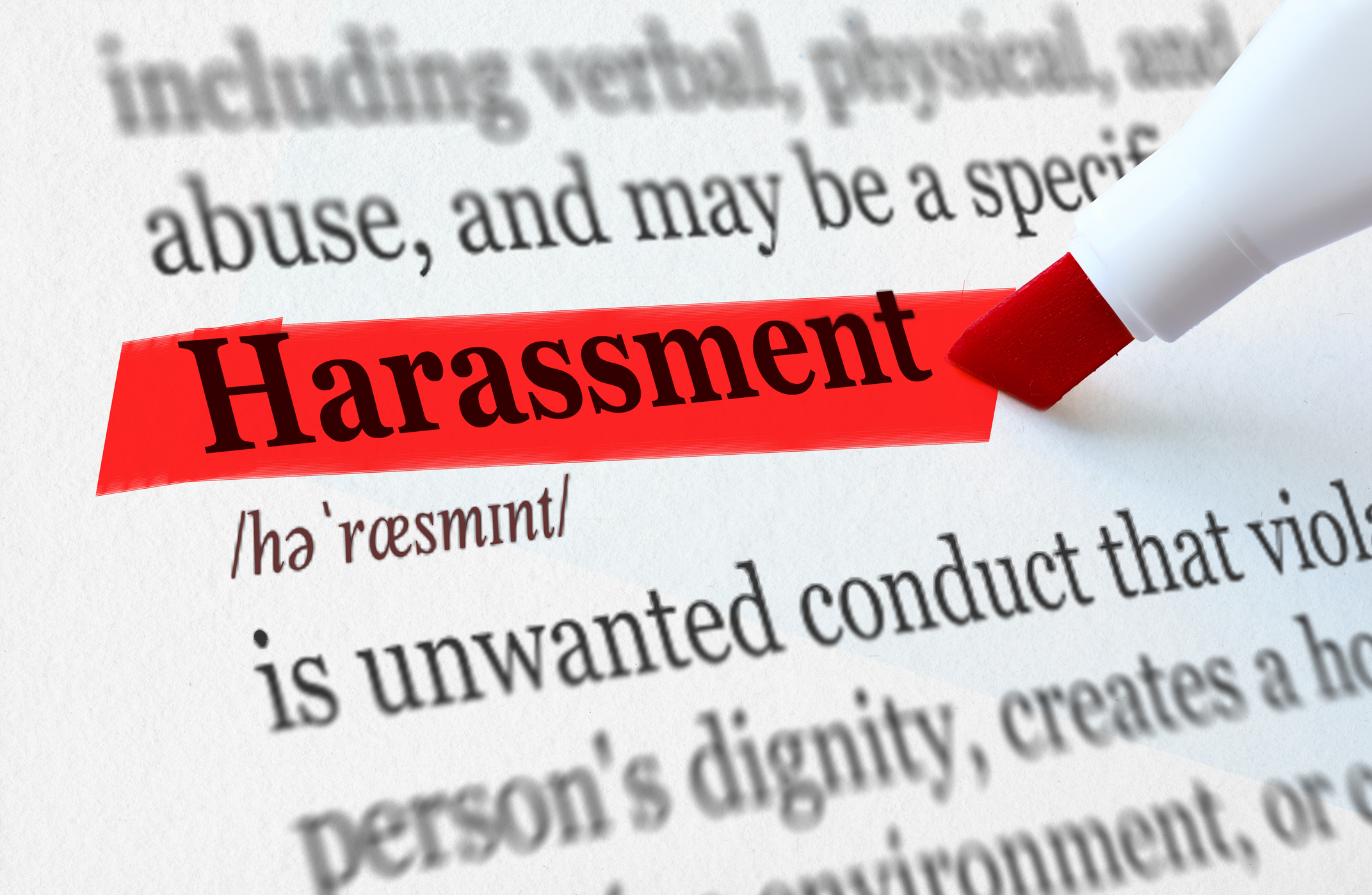 the definition of the word HARASSMENT highlighted in red