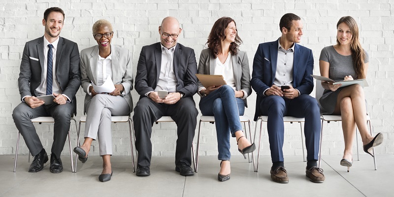 Group of diverse people are waiting for a job interview