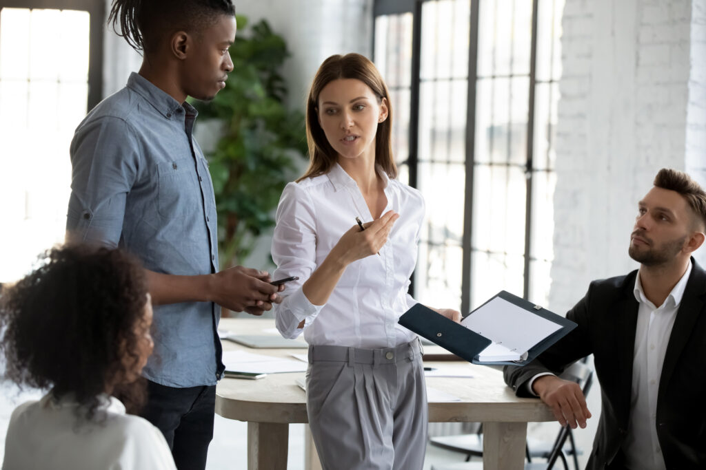 Business men and women talking